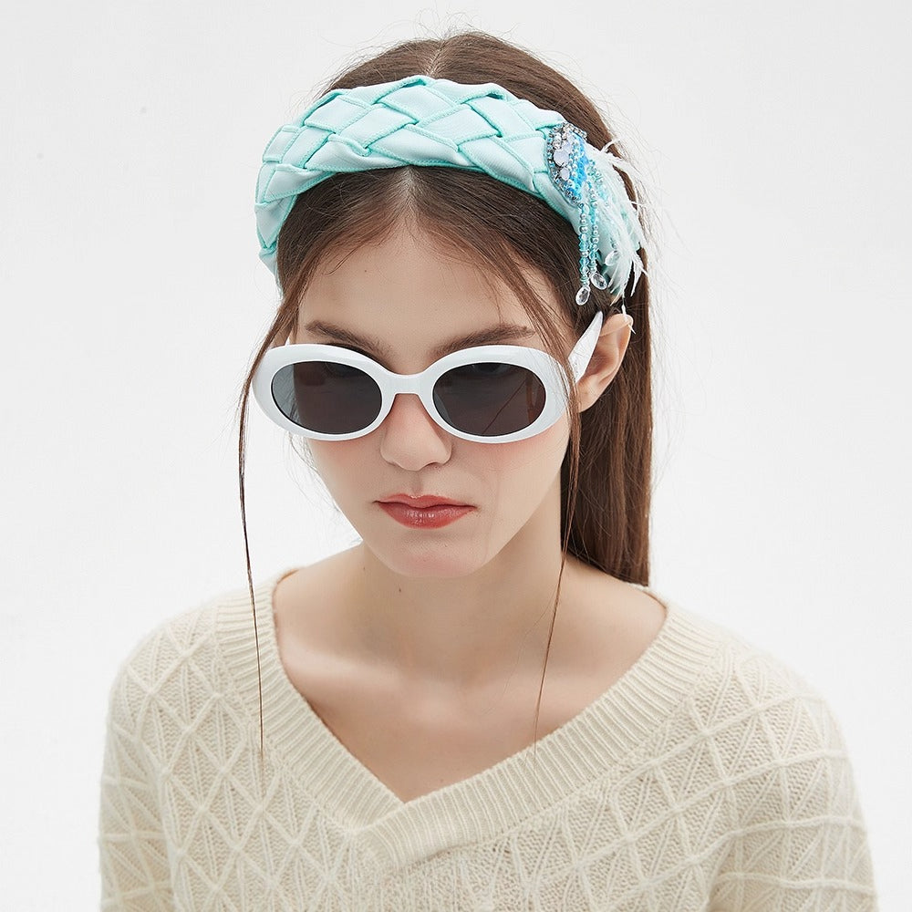 Light blue quilted satin headband with jeweled embellishments and hanging beads, women's embellished headband