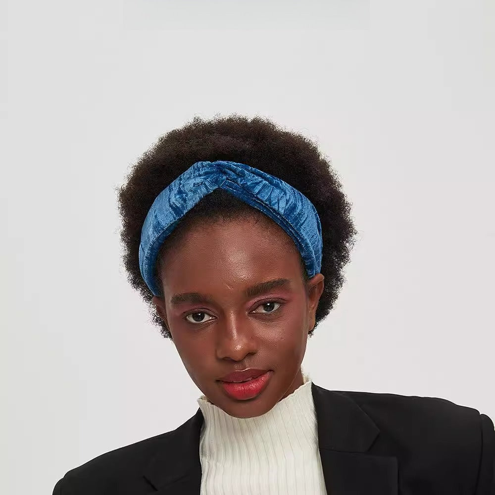 Blue velvet bow headband for women with a twisted front detail, stylish and embellished