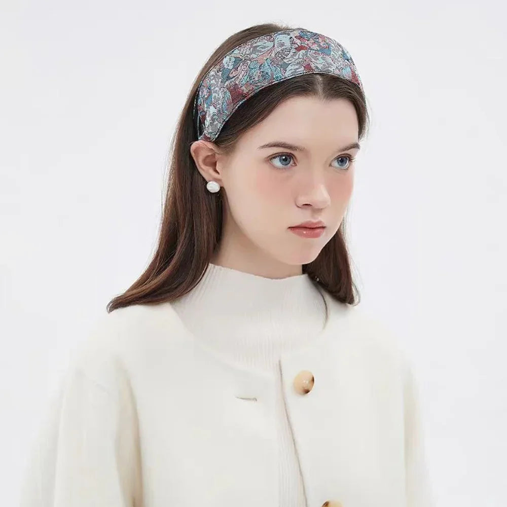 Printed women's headband with blue and burgundy floral pattern in lightweight fabric, wide style