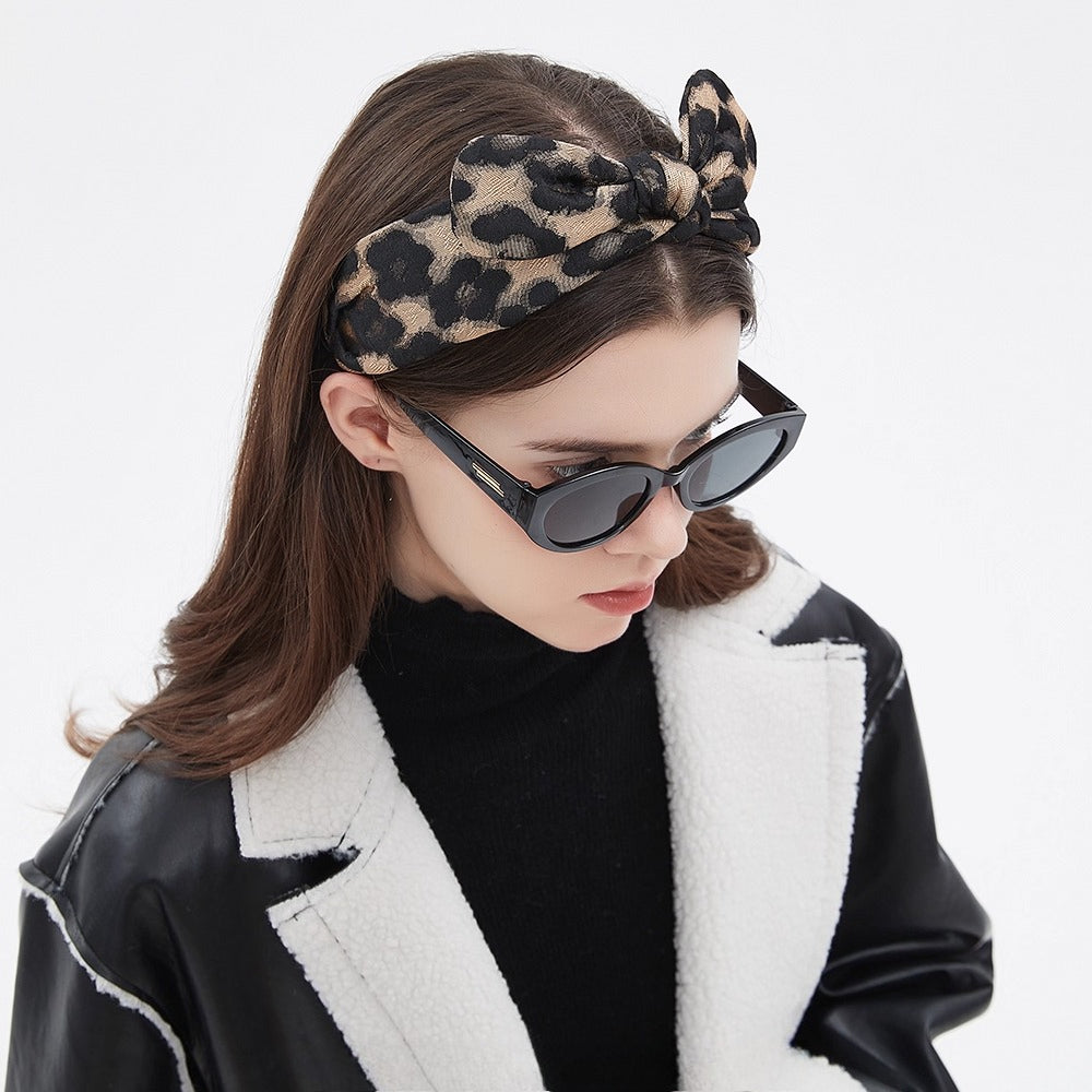 Women's leopard print fabric headband with bow knot, stylish printed accessory