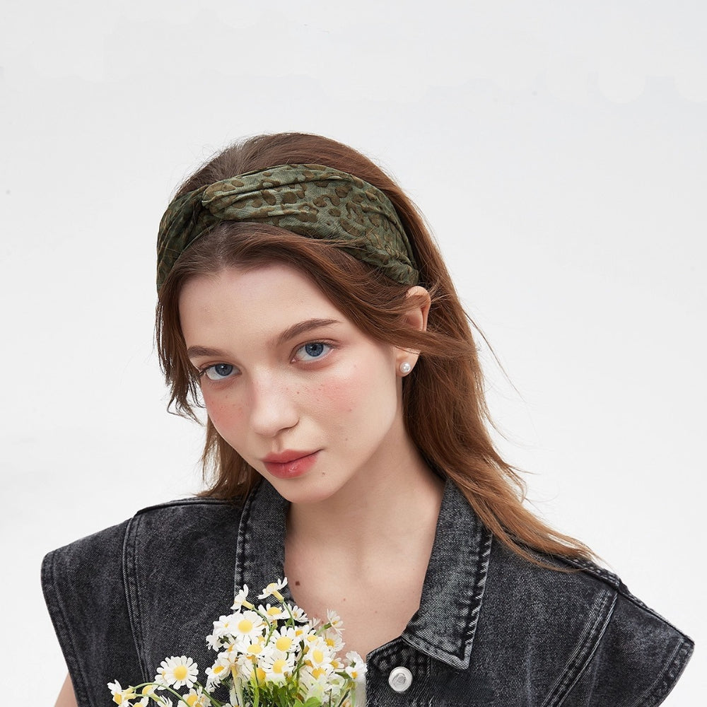 Olive green leopard print fabric women's headband with knotted front, printed bow style