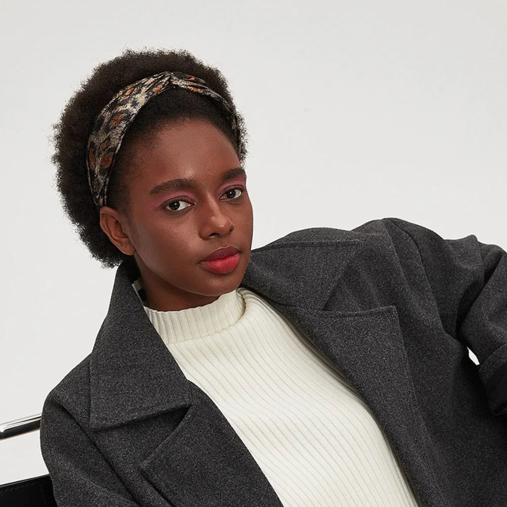 women's printed fabric headband with knotted style in leopard pattern