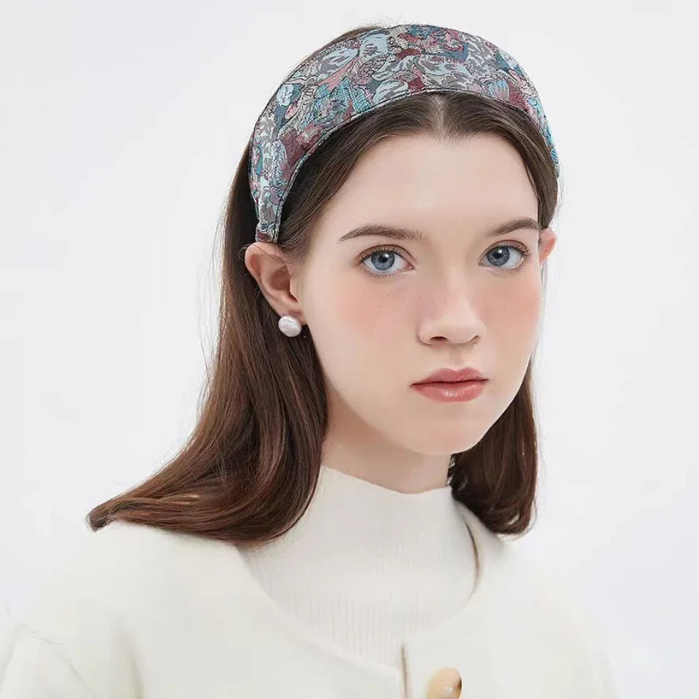 Women's wide embroidered floral headband in blue and burgundy, embellished style