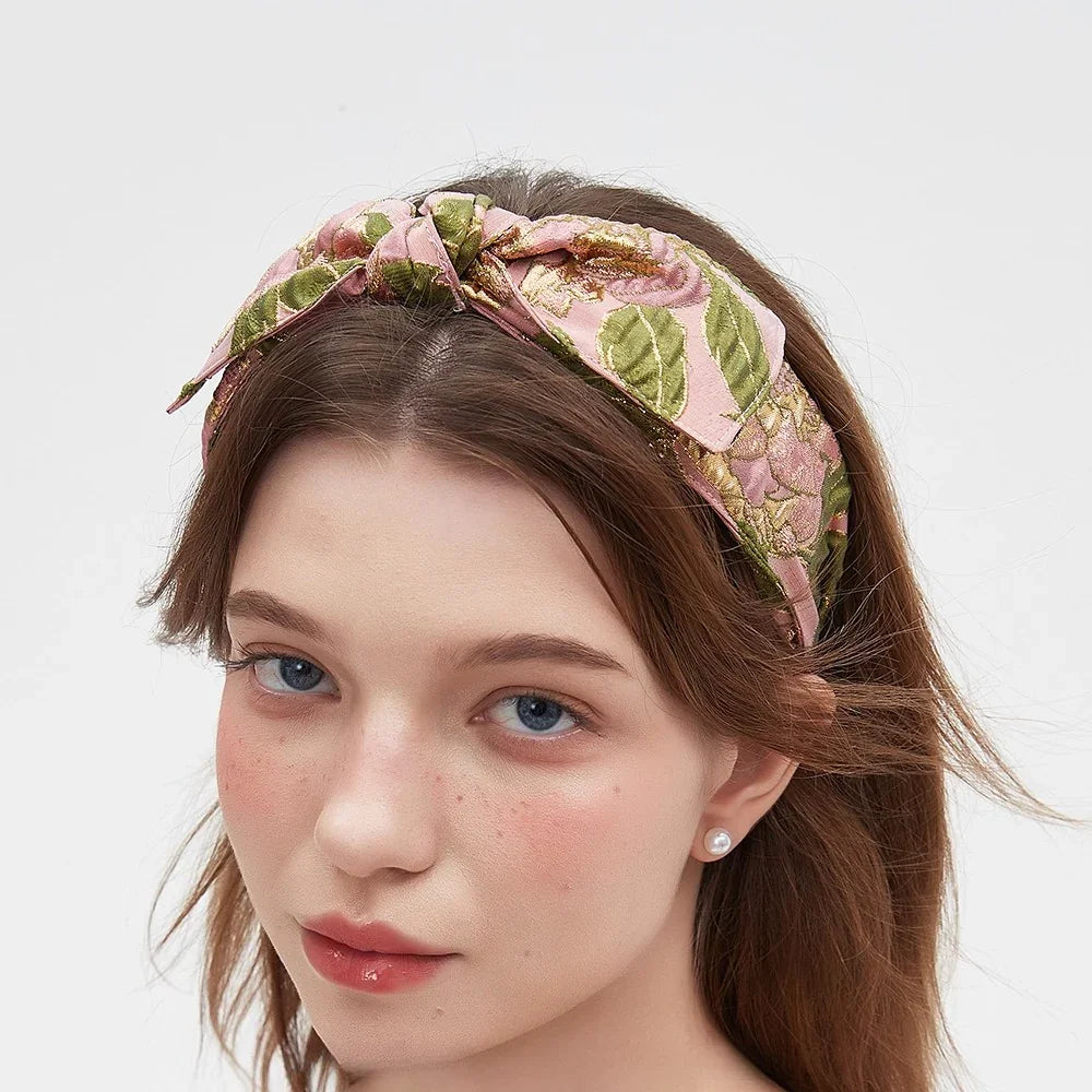 Pink and green floral printed women's bow headband with embroidered texture