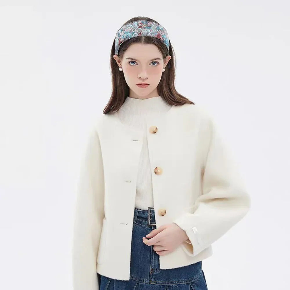 Women's printed fabric headband with pastel blue, pink, and white floral pattern