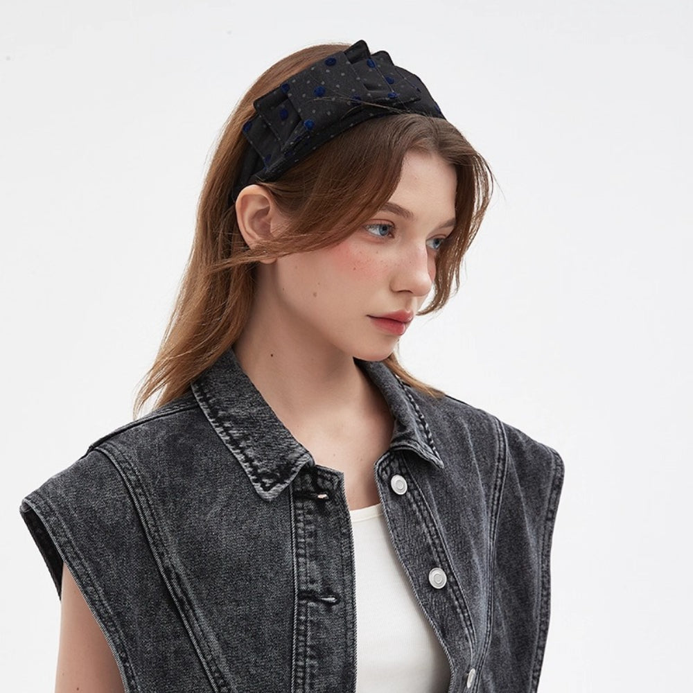 Black bow headband with blue polka dots, textured fabric, women's embellished accessory
