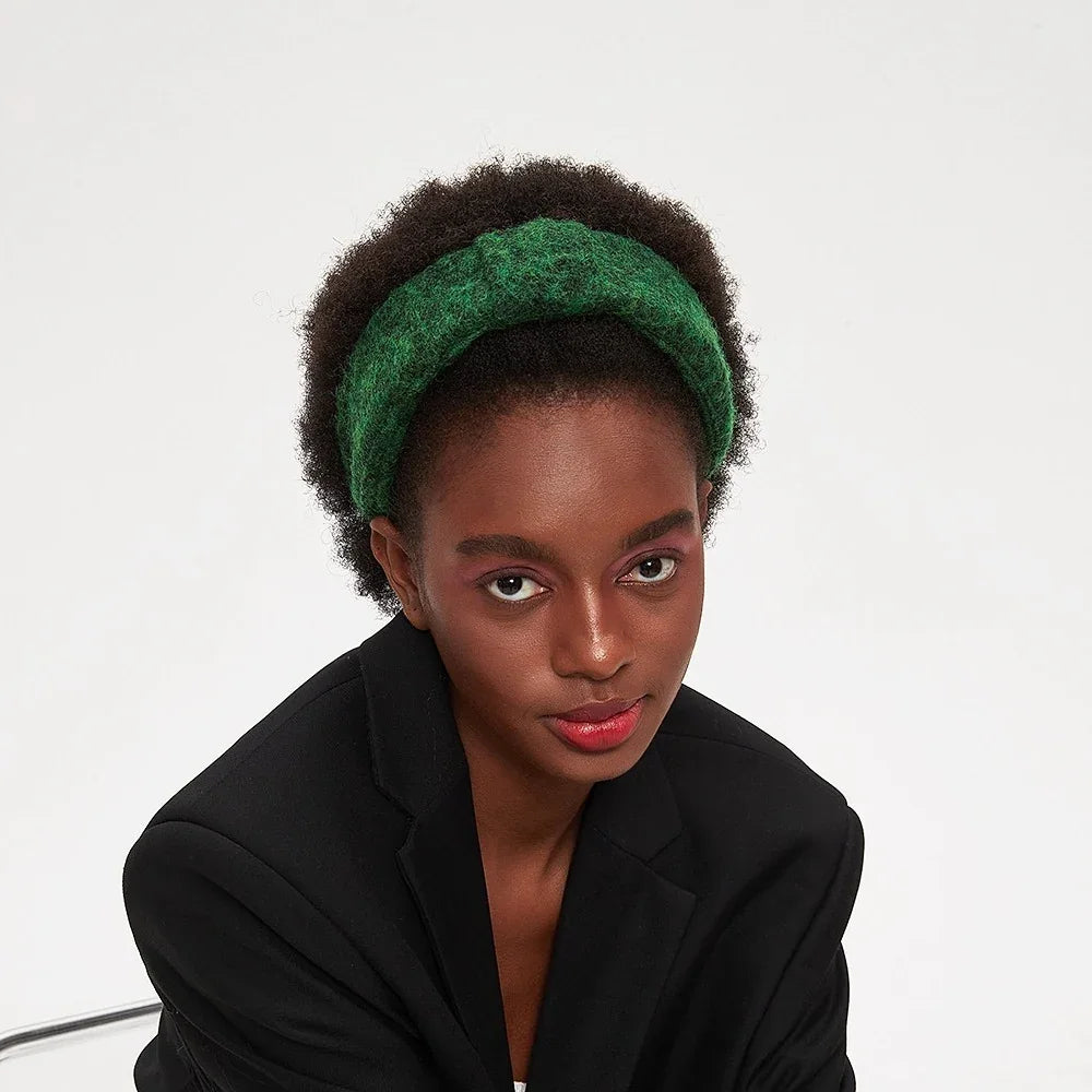 Green knitted wool minimalist headband for women with soft textured fabric