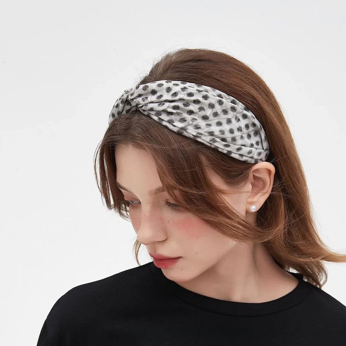 Women's grey and black printed bow headband with leopard spots pattern, soft fabric