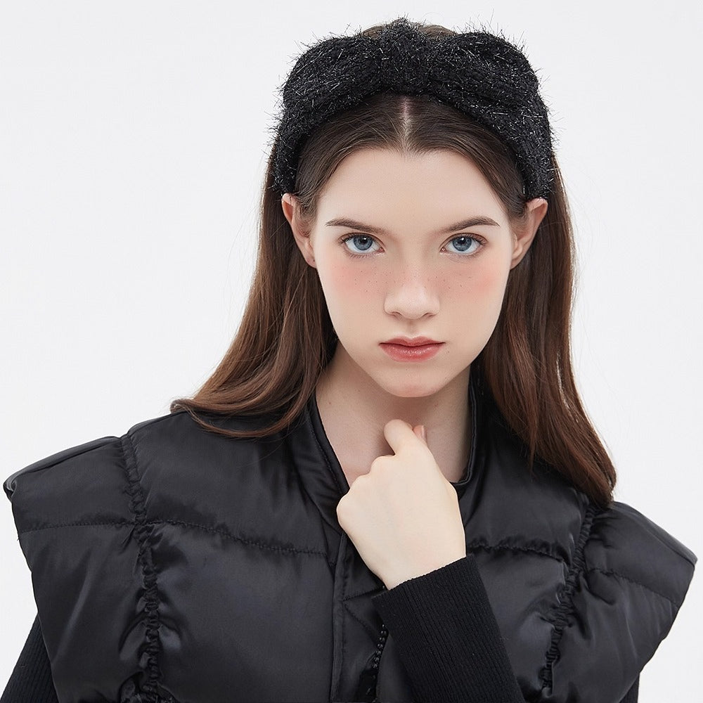 Black embellished women's headband with fuzzy texture and subtle metallic threads, bow style