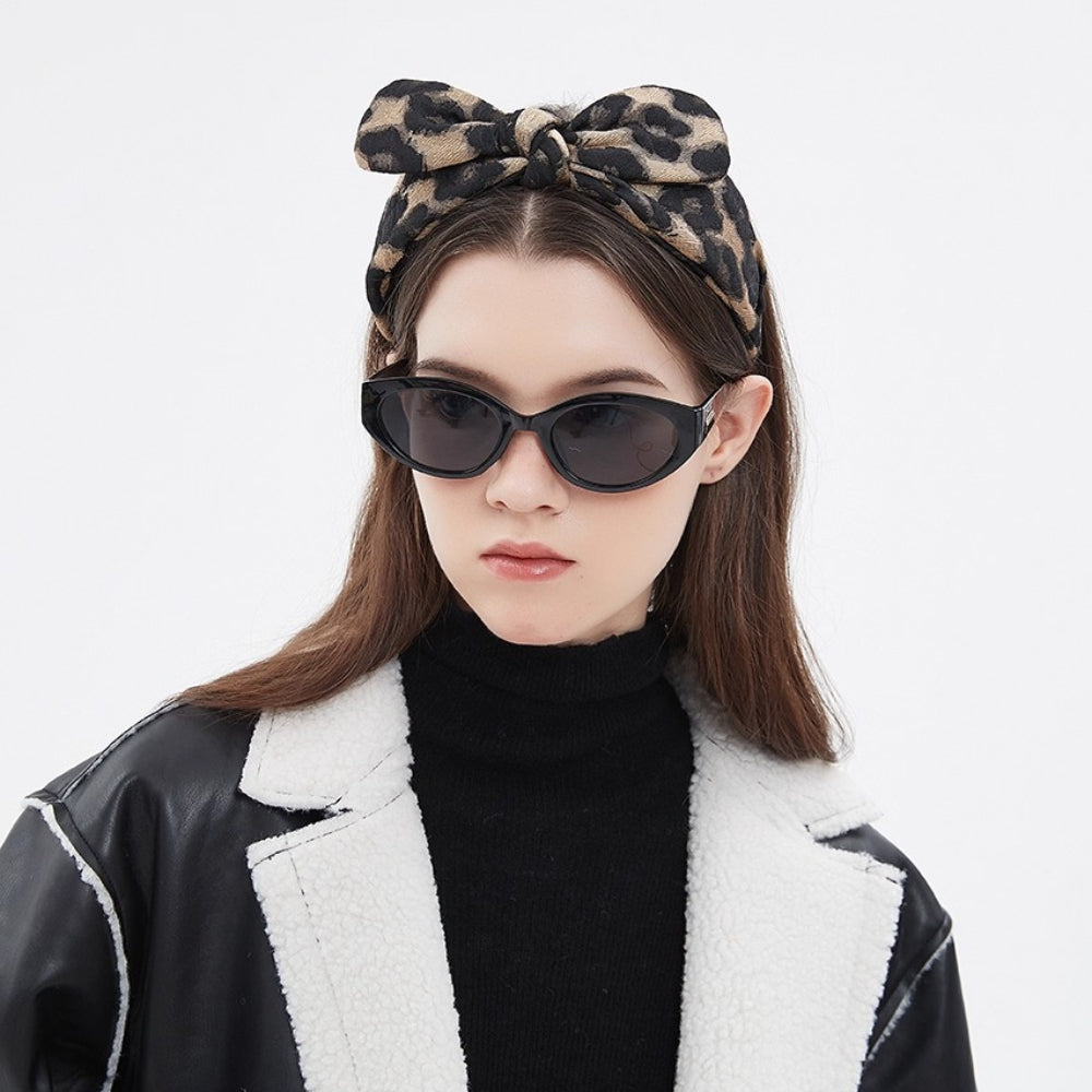 Leopard print bow headband in beige and black, soft fabric, women's embellished headband