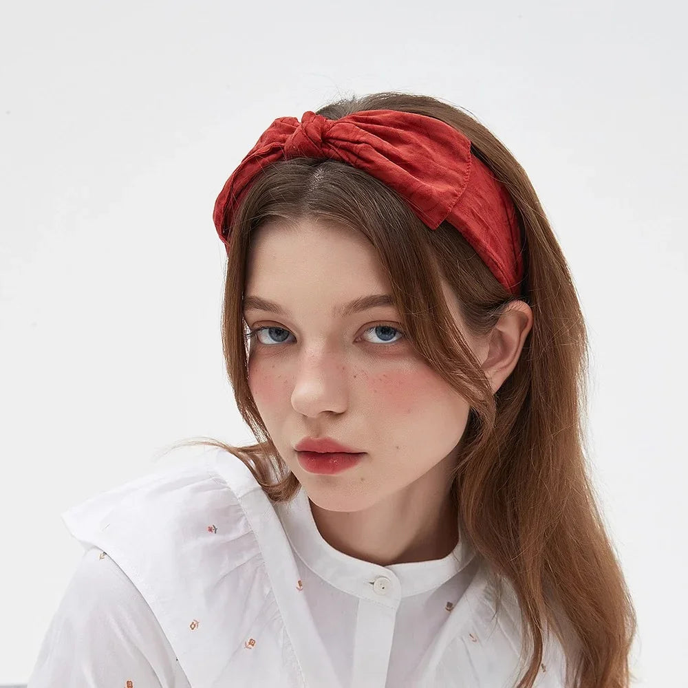 Rust red bow headband in textured fabric, women's stylish bow headband accessory