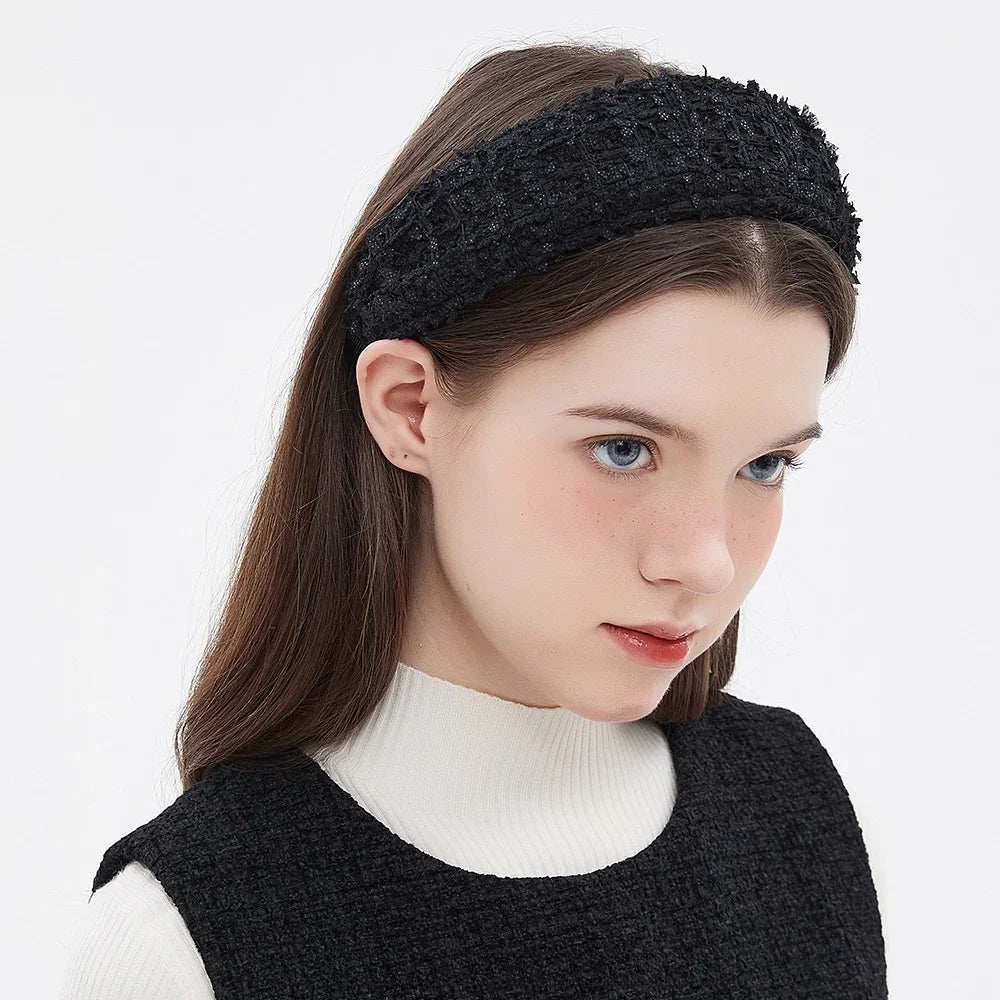 Black textured fabric embellished women's headband with a wide style
