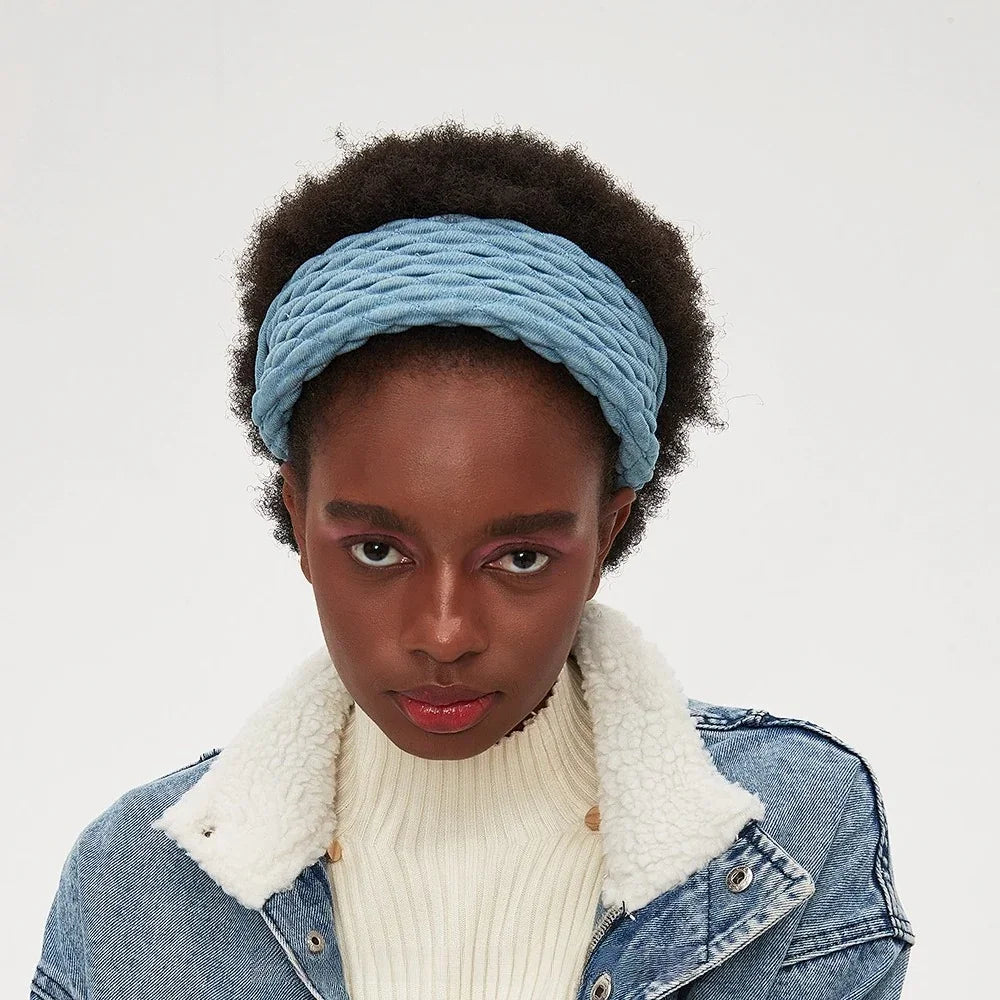 Blue twisted fabric headband in a minimalist style made of soft material