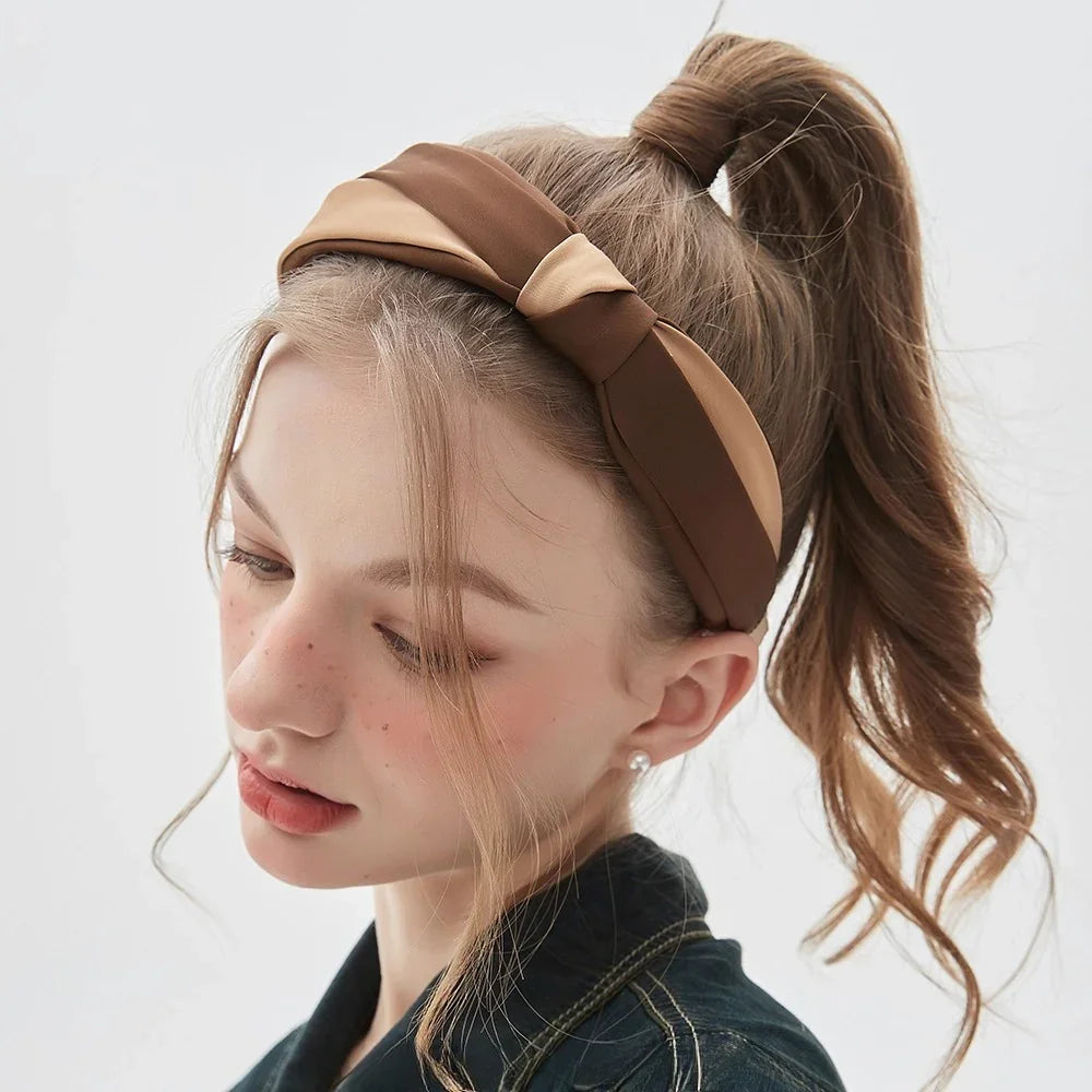 Women's two-tone brown fabric bow headband in minimalist style