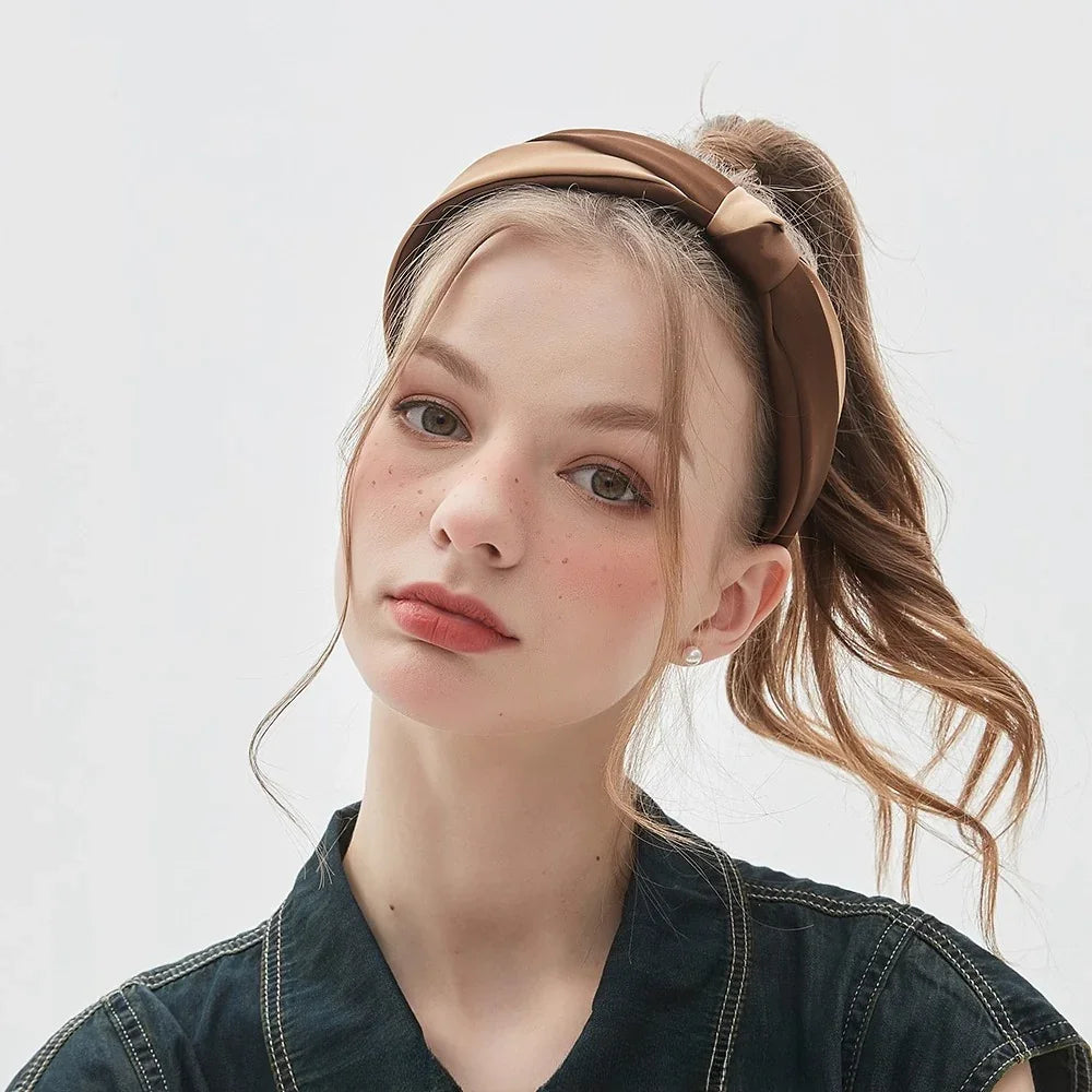 Brown and beige twisted bow headband in smooth fabric, women's embellished hair accessory