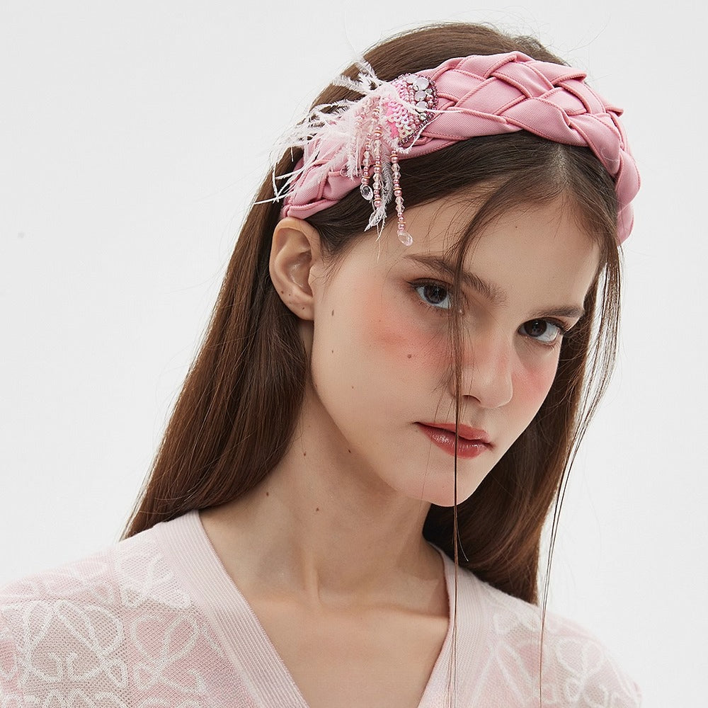 Pink braided embellished women's headband with beads and feather details