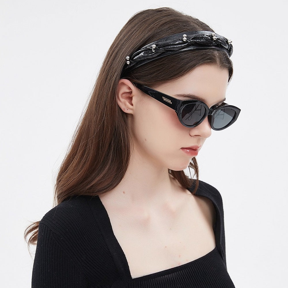 Black leather-like embellished women's headband with silver bead accents, minimalist style